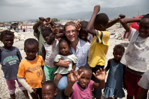 Magnus MacFarlane-Barrow with children